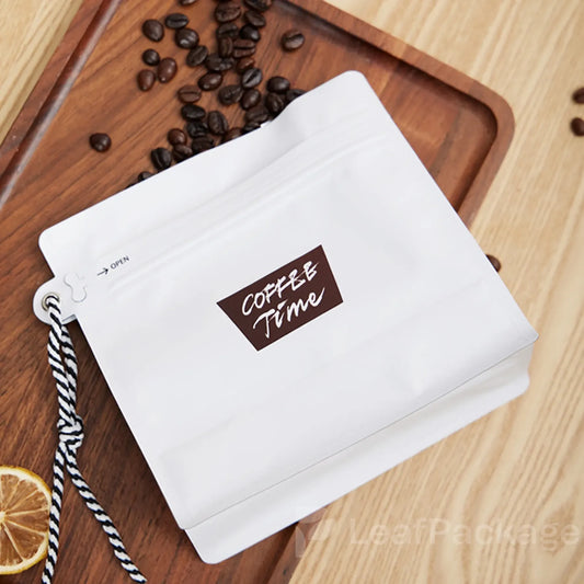 LeafPackage custom handle coffee bags made from eco-friendly kraft material, ideal for coffee shops and small businesses looking for sustainable packaging.