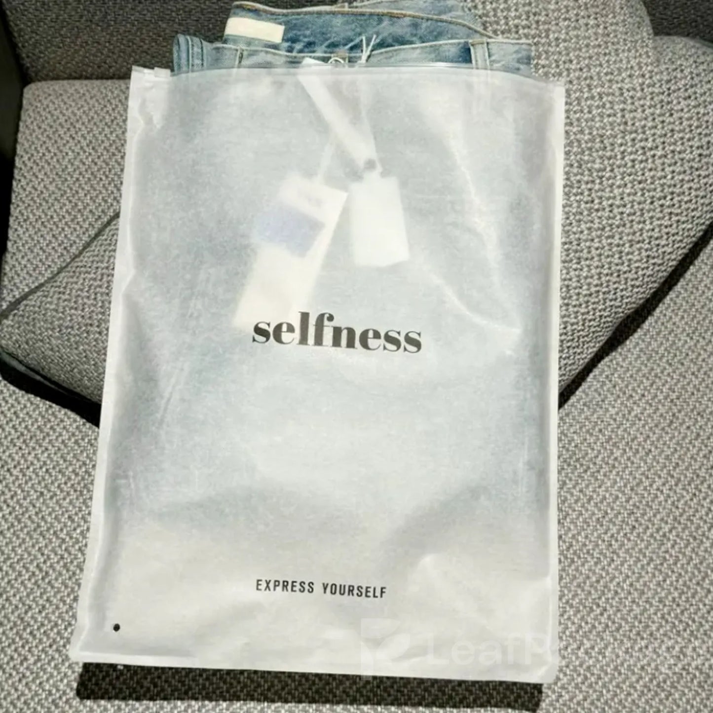 Custom printed tissue paper garment bags with logo, enhancing brand identity for fashion and retail stores.