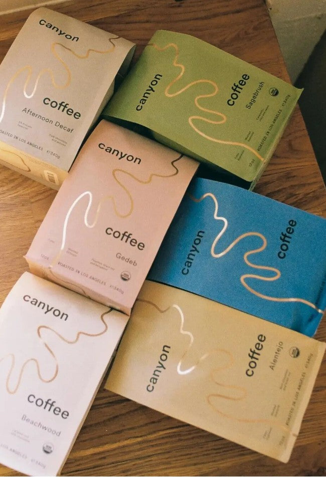Resealable coffee bags with colorful retail packaging design