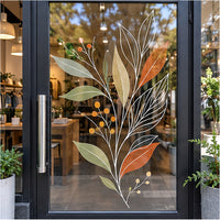 Original botanical clear vinyl decal installed on a storefront glass door