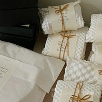 Plastic-free biodegradable honeycomb cushion paper designed to replace bubble wrap and protect fragile products during transport.