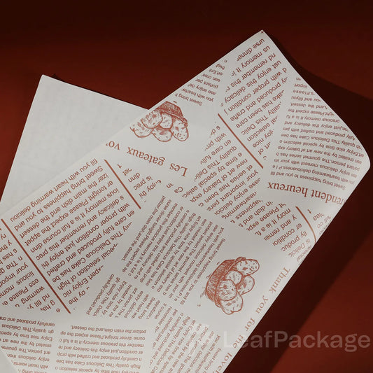 Eco-friendly greaseproof liner paper designed for sandwiches, pastries, and burgers. Customizable with your logo and brand design, ideal for small businesses focused on sustainable food packaging.