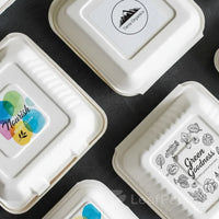 Eco takeout clamshell boxes crafted from renewable sugarcane pulp, ideal for restaurants, cafes, and catering services looking to go green.