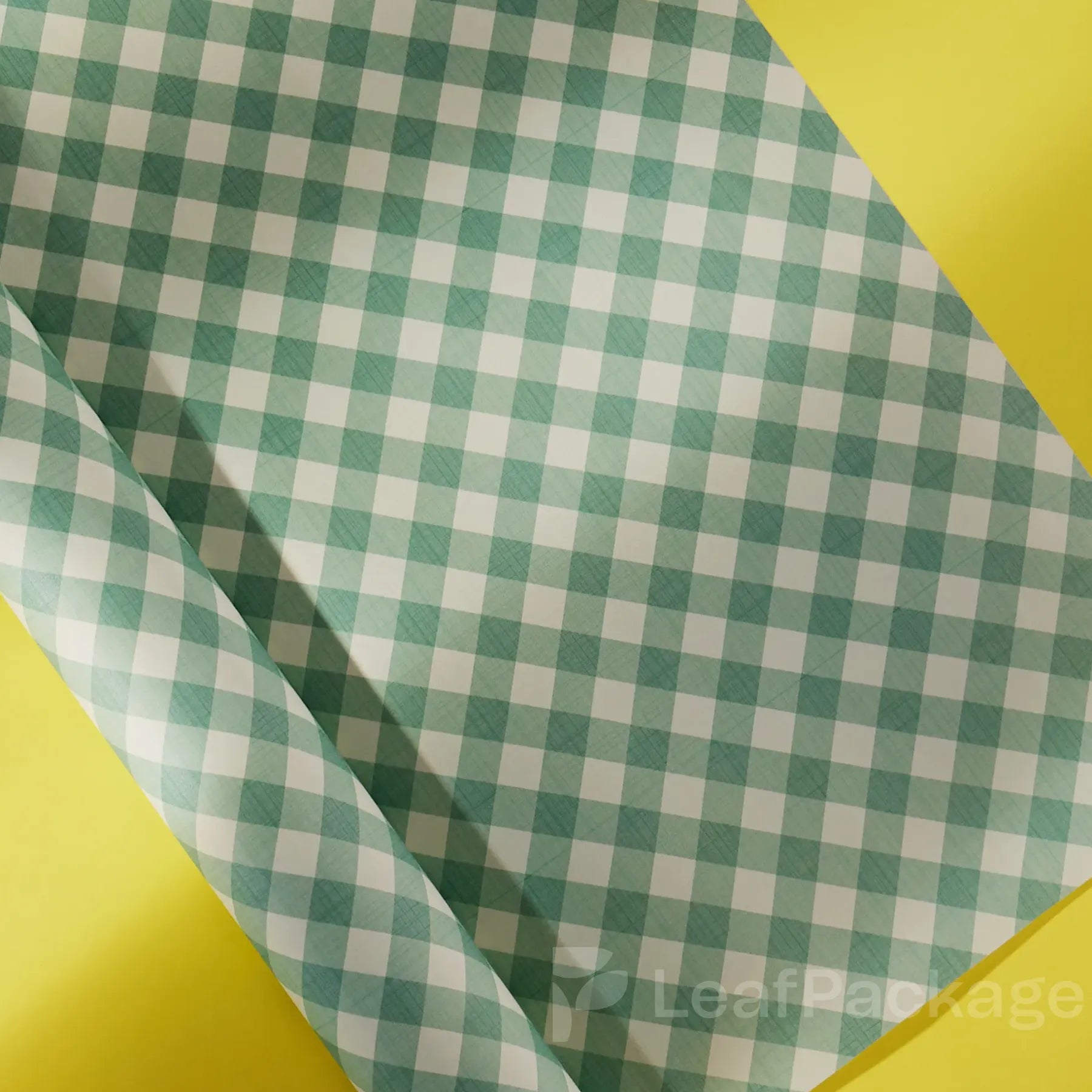 Eco kraft wrapping paper printed with your custom logo and pattern. Ideal for small businesses that value sustainability and creative, personalized packaging.