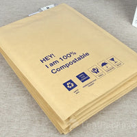 Recyclable kraft honeycomb mailer bag designed for eco-friendly shipping and protective packaging.
