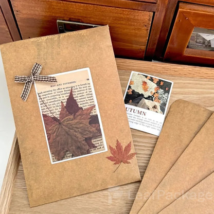 Recyclable kraft paper envelopes with custom printing, ideal for sustainable small business packaging.