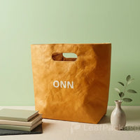 Eco-friendly die-cut kraft paper tote bags, perfect for small business branding and sustainable packaging solutions.