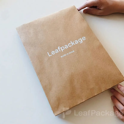 Personalized kraft paper shipping bags with logo printing, supporting eco-conscious small business packaging.