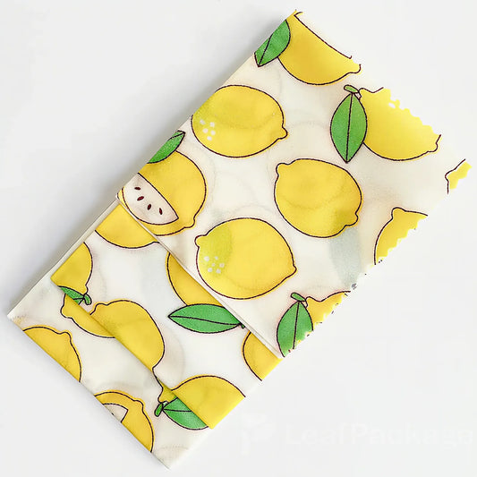 Eco-friendly custom beeswax food wrap made from organic cotton and natural beeswax, ideal for wrapping fruits, sandwiches, and leftovers in a plastic-free way.