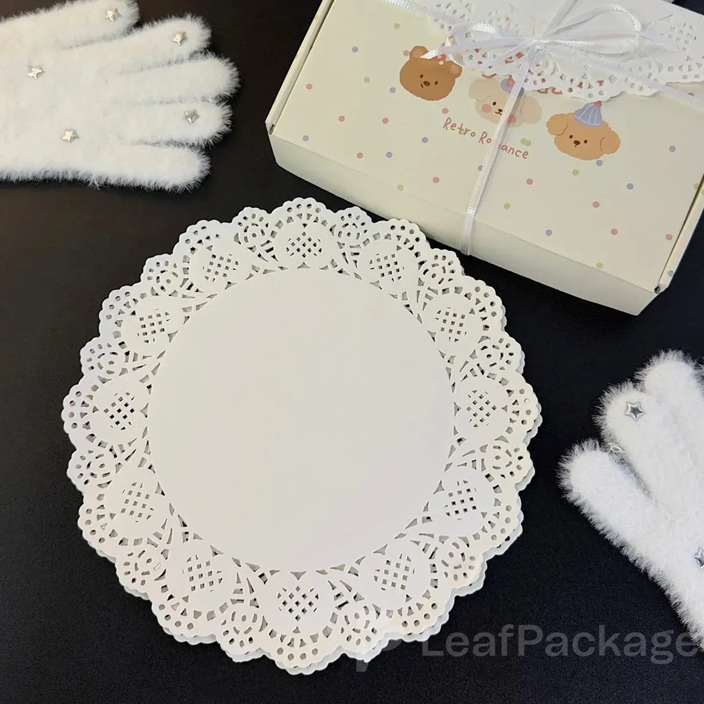 LeafPackage custom round lace food paper doilies made from food-grade paper, ideal for bakery displays, dessert packaging, and eco-friendly serving presentations.