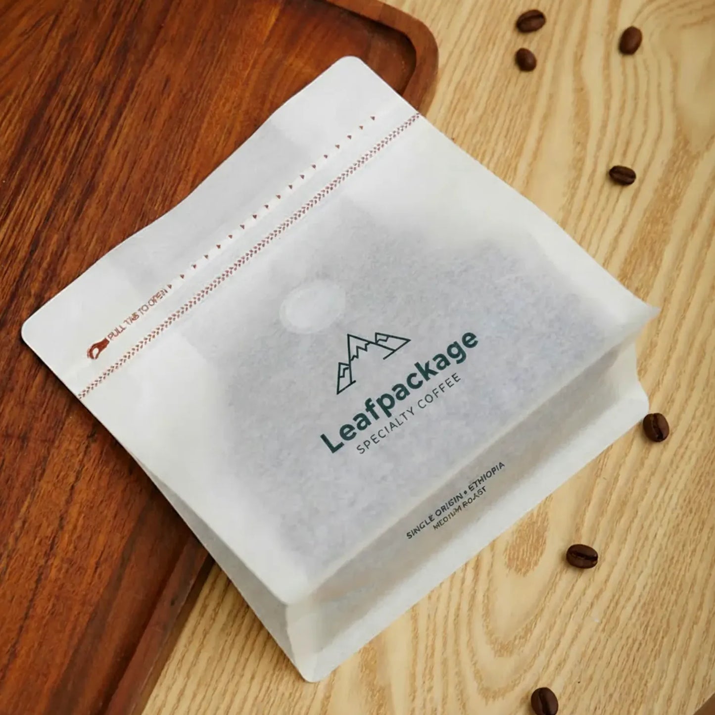 LeafPackage custom tissue paper coffee bags made from lightweight, recyclable material, ideal for eco-conscious small business packaging.