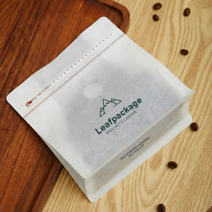 LeafPackage custom tissue paper coffee bags made from lightweight, recyclable material, ideal for eco-conscious small business packaging.