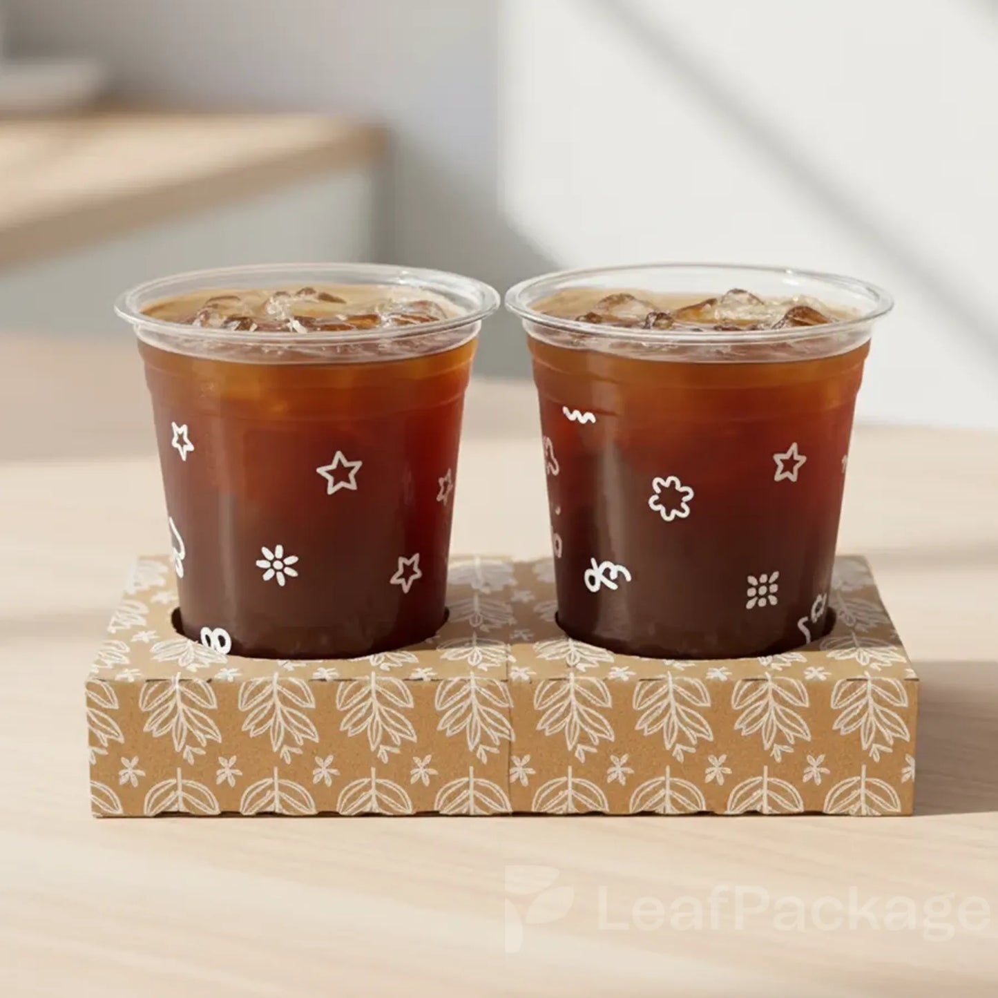 LeafPackage detachable cup trays crafted from recyclable corrugated paper, FSC certified, printable surface for personalized sustainable packaging.