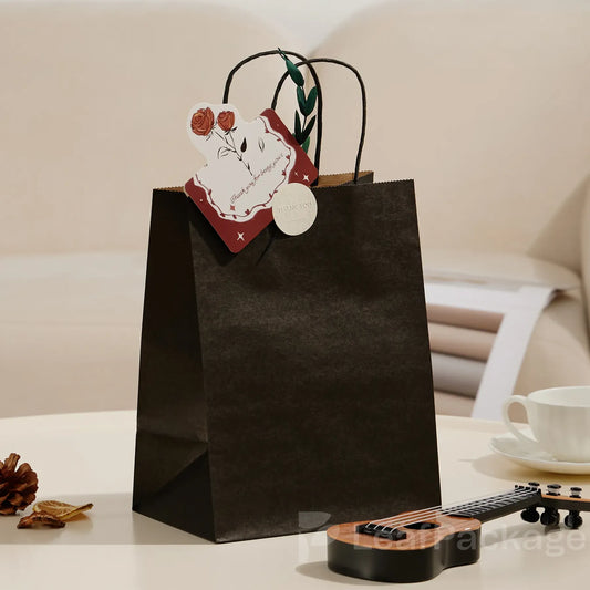 Durable kraft paper shopping bags with customizable sizes and printing options, designed for sustainable and stylish retail packaging.