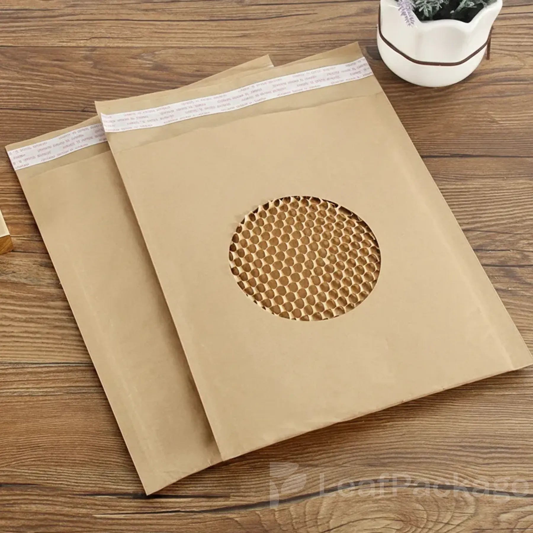 Custom logo-printed honeycomb mailer made from kraft paper, offering sustainable packaging for e-commerce brands.