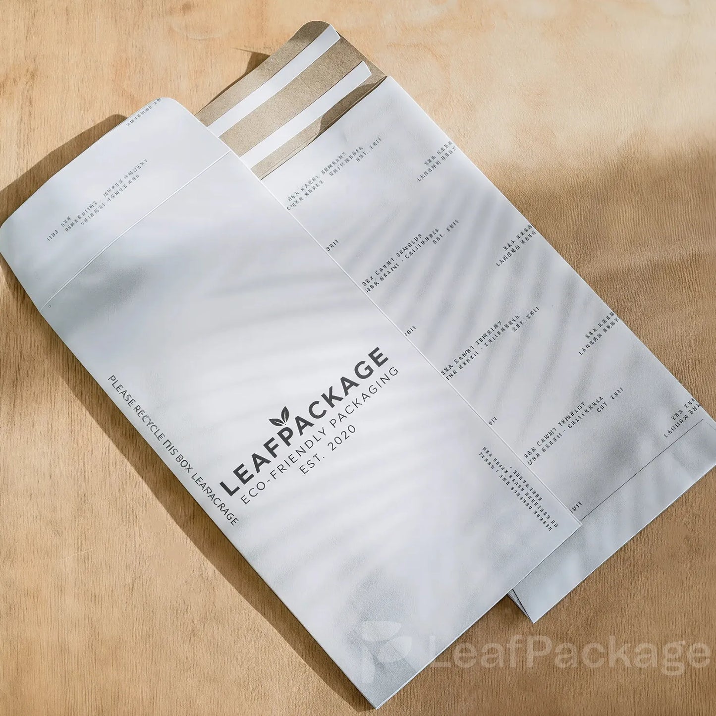 Custom logo kraft envelopes made from eco-friendly paper, perfect for branding and e-commerce packaging.