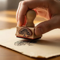 High-quality custom logo stamp made from natural wood, ideal for stamping paper bags, boxes, and envelopes with your unique brand identity.