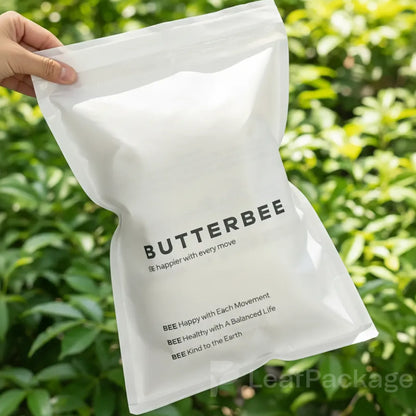 Custom printed glassine garment bags with translucent material, ideal for sustainable fashion packaging.