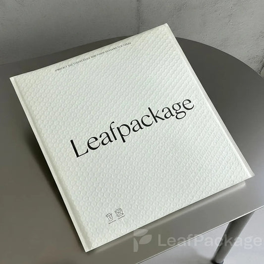 Custom printed bubble mailers made from polyethylene film with protective bubble interior.