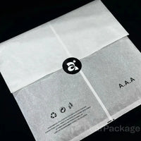 - Sustainable tissue paper clothing bags, ideal for eco-conscious apparel brands and boutiques.