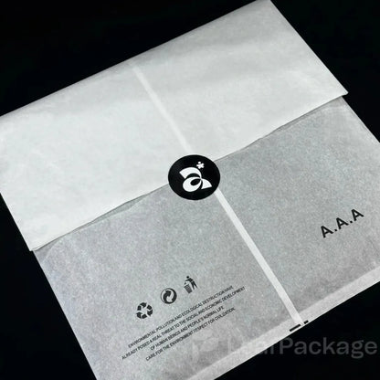 - Sustainable tissue paper clothing bags, ideal for eco-conscious apparel brands and boutiques.