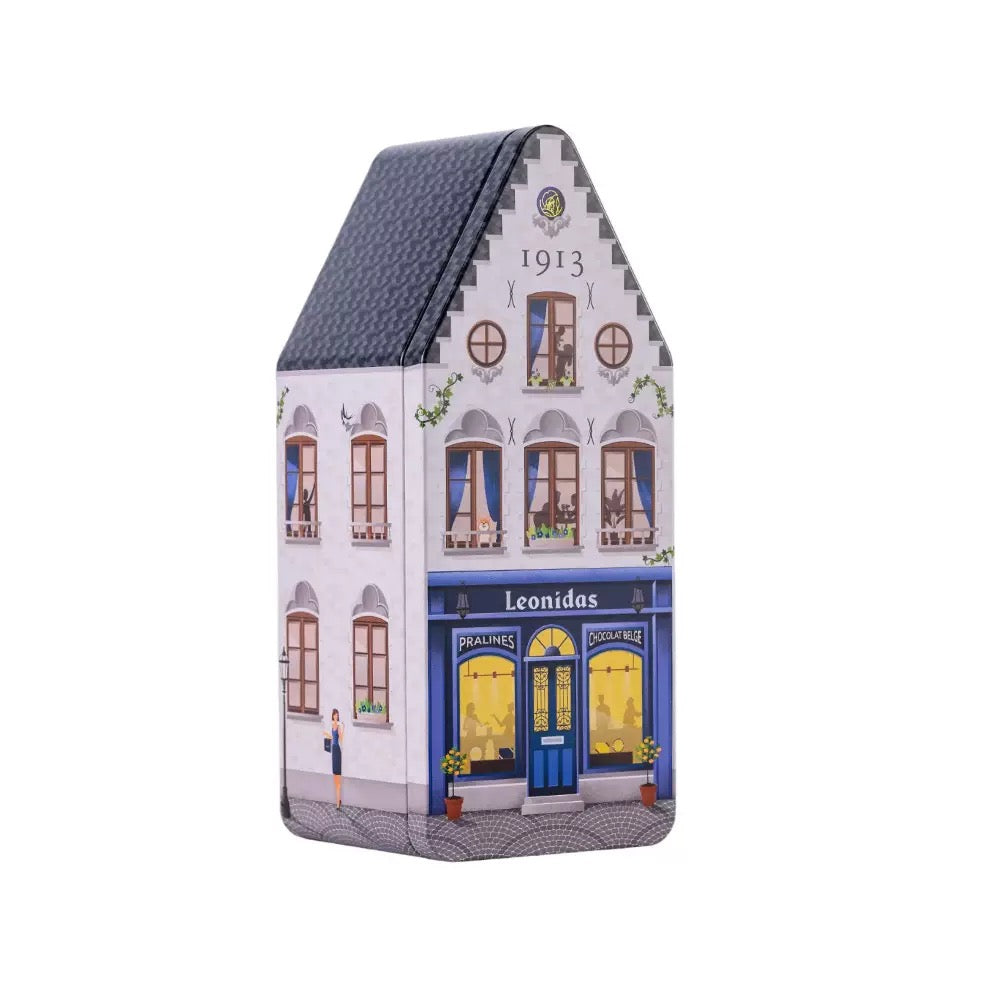 Tall shop-shaped holiday tin