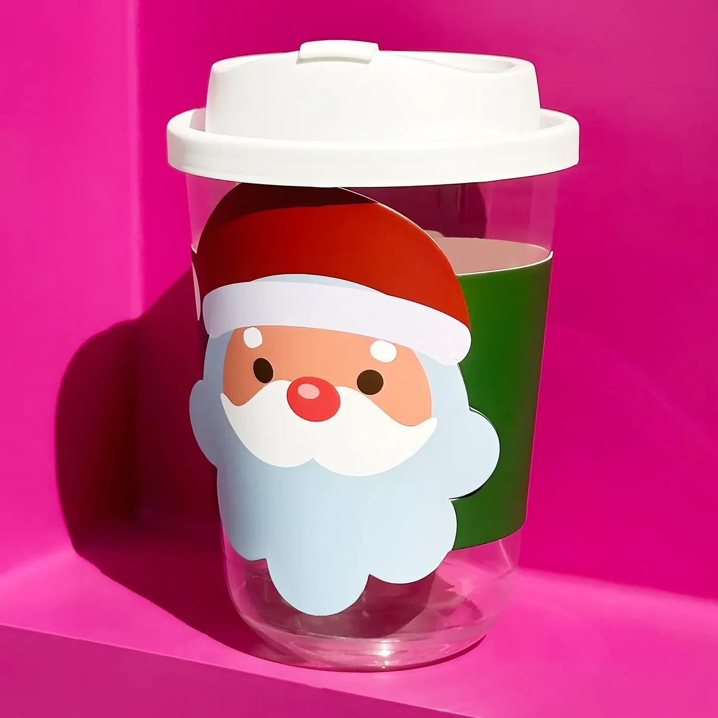 Festive paper sleeve wrapped around a takeaway cup